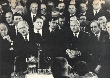 Perhaps the most evocative photograph of the Lynch era. Charlie Haughey, having been acquitted in the arms trial on Friday, October 23, 1970, challenged Lynch's leadership. Fianna Fail Ministers and TDs flocked to Dublin Airport to greet the Taoiseach on his return from America on Monday, Octorber 26. The display of solidarity ended abruptly the Haughey challenge